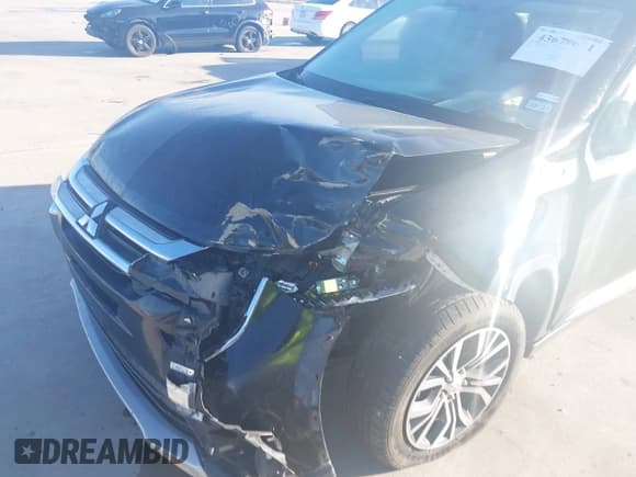 ✅ 2016 Mitsubishi Outlander SE • VIN: JA4AZ3A32GZ041928 • Lot: 43679611. Listed on IAAI with 140,310 mi. Free auction sales archive from the USA and detailed vehicle history report at DreamBid. Image 6.