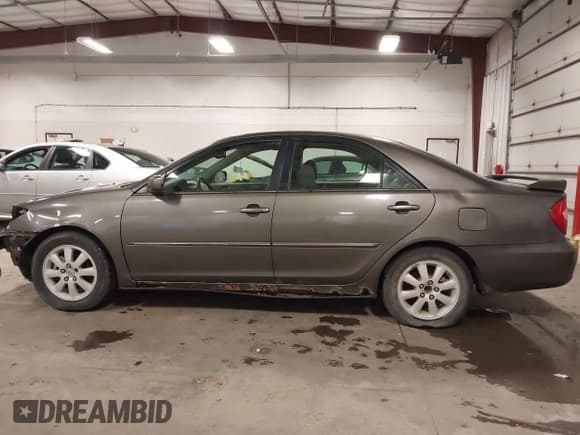 ✅ 2004 Toyota Camry XLE • VIN: 4T1BE32K74U790658 • Лот: 43116665. Опубликован ранее на IAAI с пробегом 246 808 миль. Бесплатный доступ к архиву аукционных продаж из США и подробный отчёт об истории автомобиля на DreamBid. Изображение 15.