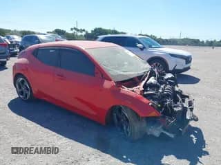 2019 Hyundai Veloster Premium z VIN KMHTG6AF9KU003775, wystawiony jako IAAI lot #41821981 z przebiegiem 61 510 mil mil oraz . Historia ofert i sprzedaży dostępna na DreamBid. Obrazek 1.