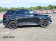 ✅ 2018 Hyundai Santa Fe Ultimate • VIN: 5XYZWDLA7JG508365 • Lot: 42994413. Listed on IAAI with 59,596 mi. Free auction sales archive from the USA and detailed vehicle history report at DreamBid. Image 14.