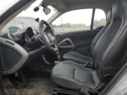 ✅ 2012 Smart fortwo Pure • VIN: WMEEJ3BA5CK573299 • Lot: 86857175. Listed on Copart with 71,721 mi. Free auction sales archive from the USA and detailed vehicle history report at DreamBid. Image 7.