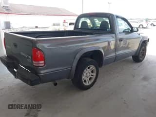 ✅ 2003 Dodge Dakota • VIN: 1D7FL16XX3S296008 • Lot: 42393154. Wystawiony na IAAI z przebiegiem 196 734 mil. Bezpłatny archiwum sprzedaży aukcyjnych z USA i szczegółowy raport historii pojazdu na DreamBid. Zdjęcie 4.