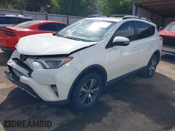 ✅ 2016 Toyota RAV4 XLE • VIN: JTMWFREVXGJ077657 • Lot: 43300105. Listed on IAAI with 140,754 mi. Free auction sales archive from the USA and detailed vehicle history report at DreamBid. Image 17.