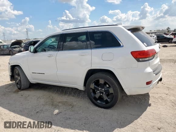 ✅ 2015 Jeep Grand Cherokee Laredo • VIN: 1C4RJEAG2FC677717 • Lot: 85536725. Listed on Copart with 65,632 mi. Free auction sales archive from the USA and detailed vehicle history report at DreamBid. Image 2.