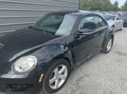 ✅ 2015 Volkswagen Beetle 1.8T • VIN: 3VWJ17ATXFM638584 • Lot: 43923514. Listed on IAAI with 148,081 mi. Free auction sales archive from the USA and detailed vehicle history report at DreamBid. Image 2.