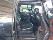 ✅ 2007 Chevrolet Suburban LTZ • VIN: 3GNFC160X7G124546 • Lot: 42062201. Listed on IAAI with 242,514 mi. Free auction sales archive from the USA and detailed vehicle history report at DreamBid. Image 8.