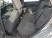 ✅ 2014 Ford Fiesta S • VIN: 3FADP4TJ4EM241501 • Lot: 96501275. Listed on Copart with 56,372 mi. Free auction sales archive from the USA and detailed vehicle history report at DreamBid. Image 10.