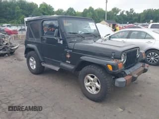 ✅ 2001 Jeep Wrangler Sahara • VIN: 1J4FA59S41P376079 • Lot: 42739280. Listed on IAAI with 255,999 mi. Free auction sales archive from the USA and detailed vehicle history report at DreamBid. Image 1.