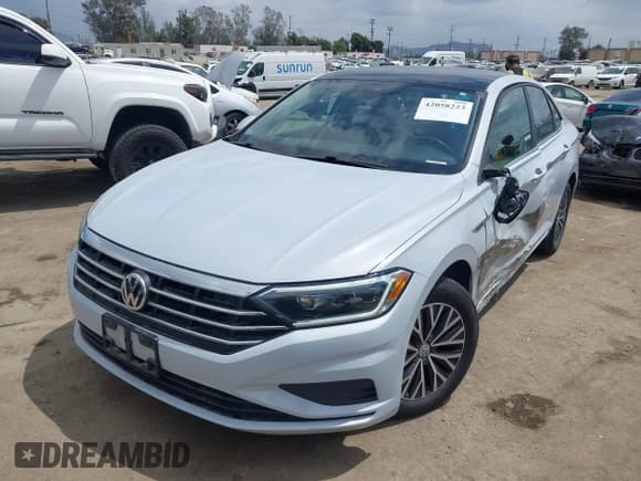 ✅ 2019 Volkswagen Jetta SEL • VIN: 3VWE57BUXKM063071 • Lot: 42058223. Listed on IAAI with 96,597 mi. Free auction sales archive from the USA and detailed vehicle history report at DreamBid. Image 2.