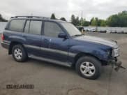 ✅ 2000 Toyota Land Cruiser • VIN: JT3HT05J0Y0082257 • Lot: 63392145. Listed on Copart with 355,619 mi. Free auction sales archive from the USA and detailed vehicle history report at DreamBid. Image 4.