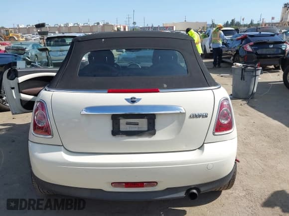 ✅ 2012 MINI Convertible • VIN: WMWZN3C53CT134194 • Lot: 42261686. Listed on IAAI with 104,099 mi. Free auction sales archive from the USA and detailed vehicle history report at DreamBid. Image 16.