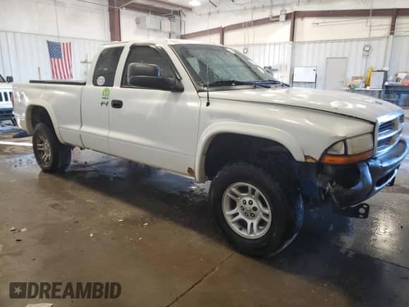 2004 Dodge Dakota Sport с VIN 1D7HG32N34S739646, выставлен на аукционе Copart как лот 74523084 с пробегом 277 000 миль миль и На запчасти • Non repairable. История ставок и продаж доступна на DreamBid. Изображение 4.