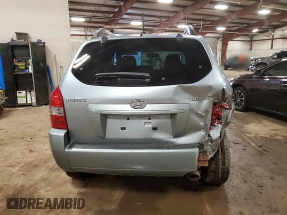 2009 Hyundai Tucson GLS z VIN KM8JM12B59U128264, wystawiony jako Copart lot #86692434 z przebiegiem 134 461 mil mil oraz Czysty tytuł • Clean title. Historia ofert i sprzedaży dostępna na DreamBid. Obrazek 7.