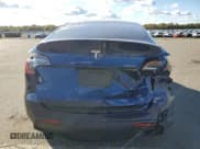 ✅ 2023 Tesla Model Y Long Range • VIN: 7SAYGDEEXPA211843 • Лот: 82739925. Опубликован ранее на Copart с пробегом 34 335 миль. Бесплатный доступ к архиву аукционных продаж из США и подробный отчёт об истории автомобиля на DreamBid. Изображение 6.