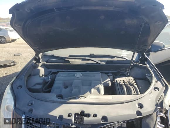 ✅ 2015 Cadillac SRX Luxury Collection • VIN: 3GYFNEE33FS570582 • Lot: 91162095. Wystawiony na Copart z przebiegiem 148 007 mil. Bezpłatny archiwum sprzedaży aukcyjnych z USA i szczegółowy raport historii pojazdu na DreamBid. Zdjęcie 12.