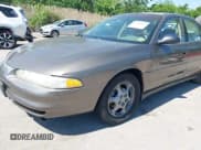 ✅ 1999 Oldsmobile Intrigue GX • VIN: 1G3WH52K5XF334949 • Lot: 42252647. Wystawiony na IAAI z przebiegiem 80 705 mil. Bezpłatny archiwum sprzedaży aukcyjnych z USA i szczegółowy raport historii pojazdu na DreamBid. Zdjęcie 6.