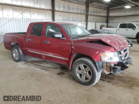 2010 Dodge Dakota Laramie z VIN 1D7CW5GP2AS228332, wystawiony jako Copart lot #71833514 z przebiegiem Nie podano mil oraz Szkoda całkowita • Salvage title. Historia ofert i sprzedaży dostępna na DreamBid. Obrazek 4.