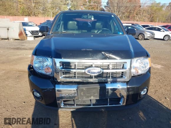 ✅ 2010 Ford Escape Limited • VIN: 1FMCU9EGXAKB80035 • Lot: 43565237. Listed on IAAI with 156,901 mi. Free auction sales archive from the USA and detailed vehicle history report at DreamBid. Image 12.