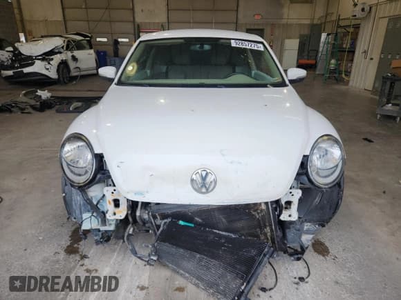 ✅ 2013 Volkswagen Beetle 2.5L • VIN: 3VWJX7AT1DM632703 • Lot: 92857275. Listed on Copart with 144,477 mi. Free auction sales archive from the USA and detailed vehicle history report at DreamBid. Image 5.