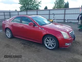 ✅ 2012 Cadillac CTS Premium • VIN: 1G6DS5E31C0104841 • Lot: 42292295. Listed on IAAI with 124,477 mi. Free auction sales archive from the USA and detailed vehicle history report at DreamBid. Image 1.