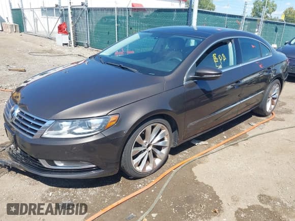 ✅ 2013 Volkswagen CC Executive • VIN: WVWGU7AN0DE555948 • Лот: 43101933. Опубликован ранее на IAAI с пробегом 184 060 миль. Бесплатный доступ к архиву аукционных продаж из США и подробный отчёт об истории автомобиля на DreamBid. Изображение 17.