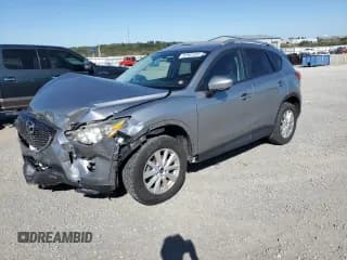 ✅ 2014 Mazda CX-5 Touring • VIN: JM3KE4CY4E0353570 • Lot: 85901055. Wystawiony na Copart z przebiegiem 181 957 mil. Bezpłatny archiwum sprzedaży aukcyjnych z USA i szczegółowy raport historii pojazdu na DreamBid. Zdjęcie 1.