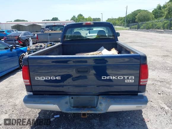 2003 Dodge Dakota SLT with VIN 1D7HL42N83S256346, listed as a IAAI auction lot 42454110 with 75,961 mi miles and . Bid and sale history available at DreamBid. Image 16.