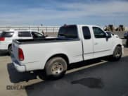 ✅ 2003 Ford F-150 XL • VIN: 2FTRX17253CA75533 • Lot: 57361145. Listed on Copart with 220,482 mi. Free auction sales archive from the USA and detailed vehicle history report at DreamBid. Image 3.