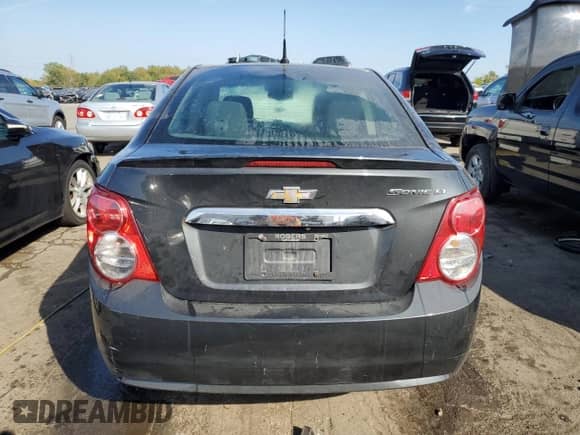 2014 Chevrolet Sonic LT с VIN 1G1JC5SH4E4106147, выставлен на аукционе Copart как лот 71822594 с пробегом 167 145 миль миль и Списание • Salvage title. История ставок и продаж доступна на DreamBid. Изображение 6.