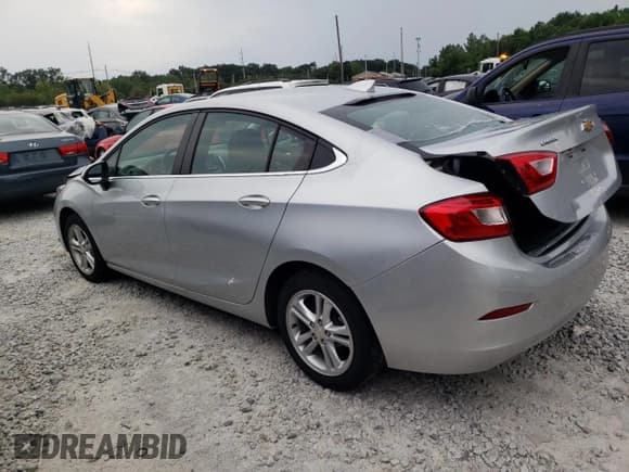 ✅ 2018 Chevrolet Cruze LT • VIN: 1G1BE5SM0J7238116 • Lot: 61329763. Listed on Copart with 74,507 mi. Free auction sales archive from the USA and detailed vehicle history report at DreamBid. Image 2.