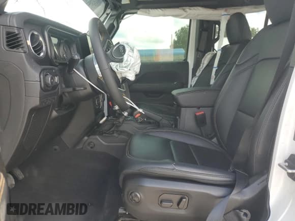 ✅ 2024 Jeep Wrangler Sahara • VIN: 1C4PJXEN9RW367840 • Lot: 56661775. Listed on Copart with 9,068 mi. Free auction sales archive from the USA and detailed vehicle history report at DreamBid. Image 7.