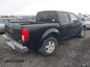 ✅ 2005 Nissan Frontier Nismo • VIN: 1N6AD07W55C411044 • Lot: 43599846. Listed on IAAI with 128,957 mi. Free auction sales archive from the USA and detailed vehicle history report at DreamBid. Image 4.