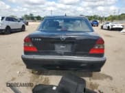 ✅ 2000 Mercedes-Benz C 230/260/280/320 • VIN: WDBHA29G4YA848172 • Лот: 64968985. Опубликован ранее на Copart с пробегом Не указан. Бесплатный доступ к архиву аукционных продаж из США и подробный отчёт об истории автомобиля на DreamBid. Изображение 6.