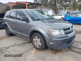 ✅ 2012 Dodge Journey American Value • VIN: 3C4PDCAB2CT206822 • Lot: 43721374. Listed on IAAI with 151,345 mi. Free auction sales archive from the USA and detailed vehicle history report at DreamBid. Image 1.