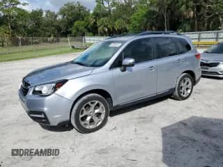 2018 Subaru Forester Touring with VIN JF2SJAWC7JH576542, listed as a Copart auction lot 81283415 with 67,738 mi miles and Salvage title. Bid and sale history available at DreamBid. Image 1.