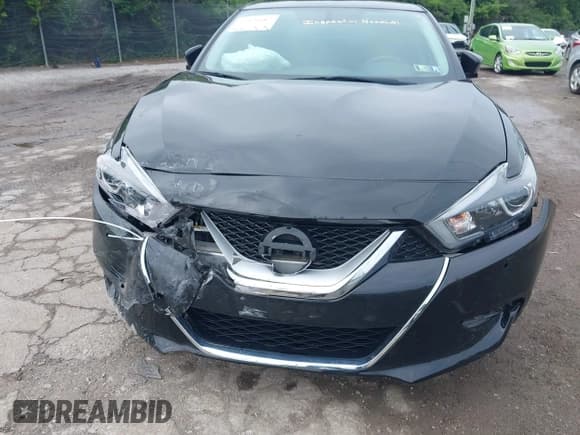 ✅ 2016 Nissan Maxima S • VIN: 1N4AA6AP5GC415524 • Lot: 42370187. Listed on IAAI with 71,642 mi. Free auction sales archive from the USA and detailed vehicle history report at DreamBid. Image 13.