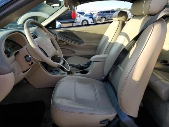 ✅ 2004 Ford Mustang Deluxe • VIN: 1FAFP44414F125267 • Lot: 74595714. Listed on Copart with Not provided. Free auction sales archive from the USA and detailed vehicle history report at DreamBid. Image 7.