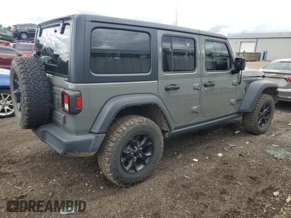 ✅ 2021 Jeep Wrangler Unlimited Sport S • VIN: 1C4HJXDG9MW646270 • Lot: 71705995. Listed on Copart with 85,287 mi. Free auction sales archive from the USA and detailed vehicle history report at DreamBid. Image 3.