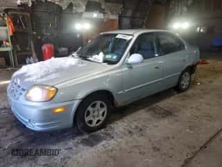 2005 Hyundai Accent GLS z VIN KMHCG45C15U602419, wystawiony jako Copart lot #47759675 z przebiegiem 58 133 mil mil oraz Szkoda całkowita • Salvage title. Historia ofert i sprzedaży dostępna na DreamBid. Obrazek 1.