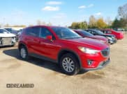 ✅ 2014 Mazda CX-5 Touring • VIN: JM3KE2CY9E0366805 • Lot: 43557677. Wystawiony na IAAI z przebiegiem 210 857 mil. Bezpłatny archiwum sprzedaży aukcyjnych z USA i szczegółowy raport historii pojazdu na DreamBid. Zdjęcie 1.