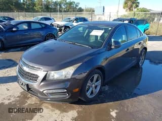 ✅ 2015 Chevrolet Cruze LT • VIN: 1G1PE5SB5F7292331 • Lot: 43580996. Listed on IAAI with 111,503 mi. Free auction sales archive from the USA and detailed vehicle history report at DreamBid. Image 2.