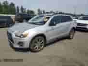 2013 Mitsubishi Outlander LE with VIN 4A4AR5AU1DE022535, listed as a Copart auction lot 70002895 with 297,561 mi miles and Salvage title. Bid and sale history available at DreamBid. Image 1.