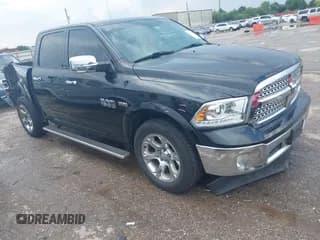 ✅ 2017 Ram 1500 Laramie • VIN: 1C6RR6NT7HS714590 • Lot: 43065197. Listed on IAAI with 122,647 mi. Free auction sales archive from the USA and detailed vehicle history report at DreamBid. Image 1.