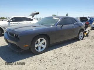 ✅ 2012 Dodge Challenger SXT • VIN: 2C3CDYAG7CH180206 • Lot: 61907414. Wystawiony na Copart z przebiegiem 119 197 mil. Bezpłatny archiwum sprzedaży aukcyjnych z USA i szczegółowy raport historii pojazdu na DreamBid. Zdjęcie 1.