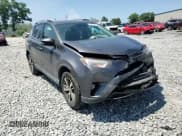 ✅ 2018 Toyota RAV4 XLE • VIN: 2T3WFREV2JW450330 • Lot: 57656175. Listed on Copart with 209,950 mi. Free auction sales archive from the USA and detailed vehicle history report at DreamBid. Image 14.