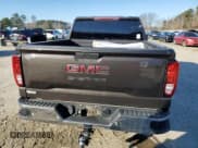 ✅ 2021 GMC Sierra 1500 • VIN: 3GTU9AEF0MG128069 • Lot: 86120714. Wystawiony na Copart z przebiegiem 98 906 mil. Bezpłatny archiwum sprzedaży aukcyjnych z USA i szczegółowy raport historii pojazdu na DreamBid. Zdjęcie 6.