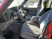 ✅ 1998 Jeep Cherokee Sport • VIN: 1J4FJ68S2WL210617 • Лот: 91206975. Опубликован ранее на Copart с пробегом 256 994 миль. Бесплатный доступ к архиву аукционных продаж из США и подробный отчёт об истории автомобиля на DreamBid. Изображение 7.