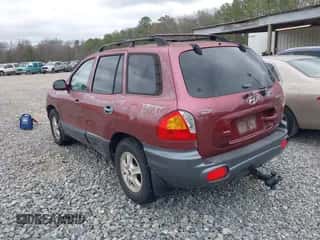 2002 Hyundai Santa Fe GLS z VIN KM8SC73D72U306997, wystawiony jako IAAI lot #41519773 z przebiegiem 244 398 mil mil oraz . Historia ofert i sprzedaży dostępna na DreamBid. Obrazek 3.