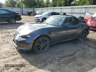✅ 2019 Mazda MX-5 Miata Grand Touring • VIN: JM1NDAM70K0302334 • Lot: 59802625. Listed on Copart with 67,990 mi. Free auction sales archive from the USA and detailed vehicle history report at DreamBid. Image 1.