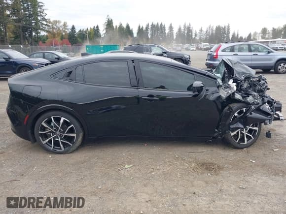 ✅ 2026 Toyota Prius XSE • VIN: JTDACACU1T3058833 • Lot: 43512928. Listed on IAAI with 1,885 mi. Free auction sales archive from the USA and detailed vehicle history report at DreamBid. Image 13.